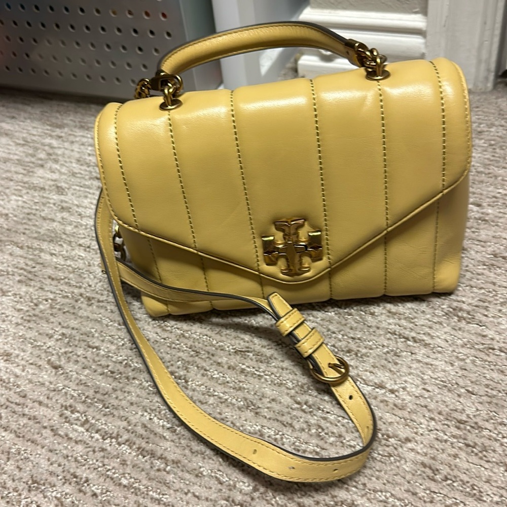 Tory Burch Kira medium butter colored cross body. Almost new condition
